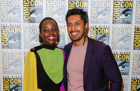 Tenoch Huerta strikes a pose for the camera alongside his co-star.
